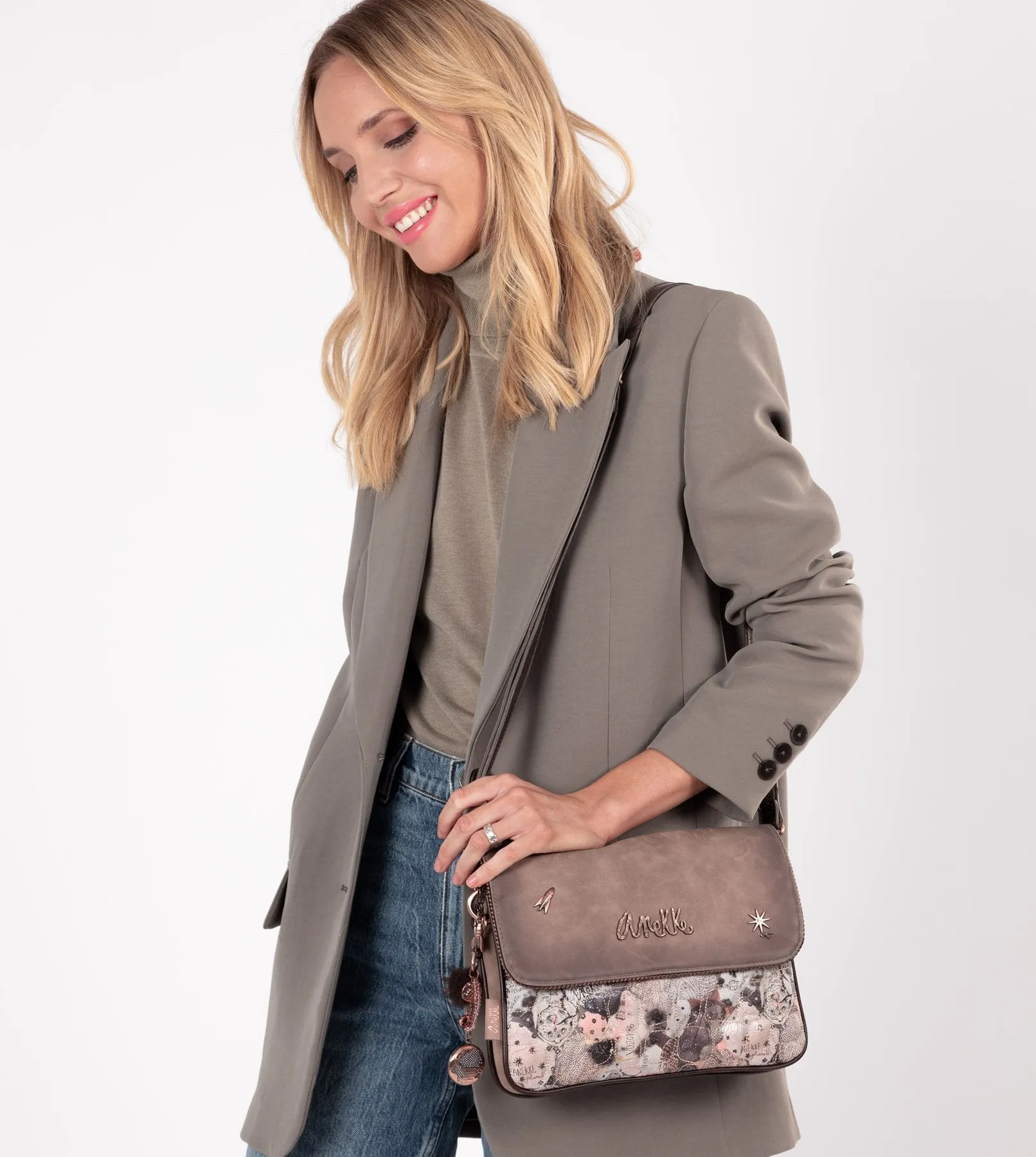 Exquisite universe crossbody bag with a flap closure