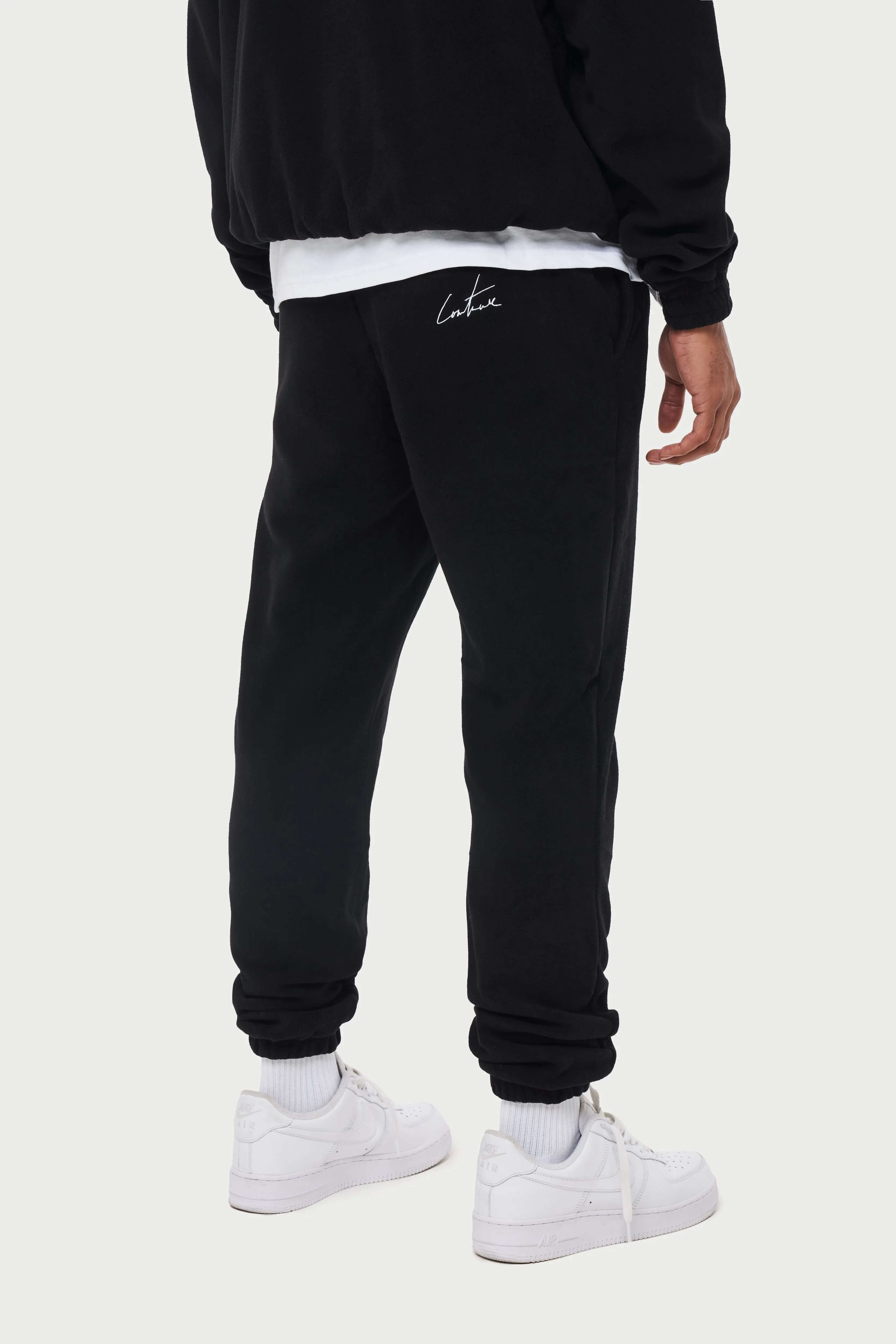 POLAR FLEECE RUBBER BADGE TRACKSUIT JOGGERS - BLACK